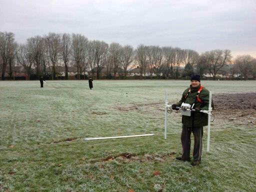 Archeox volunteers carrying out a gradiometer survey